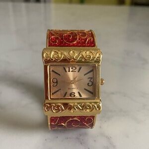 Avon Gold Tone and Red Enamel Scroll Design Hinge Cuff Watch